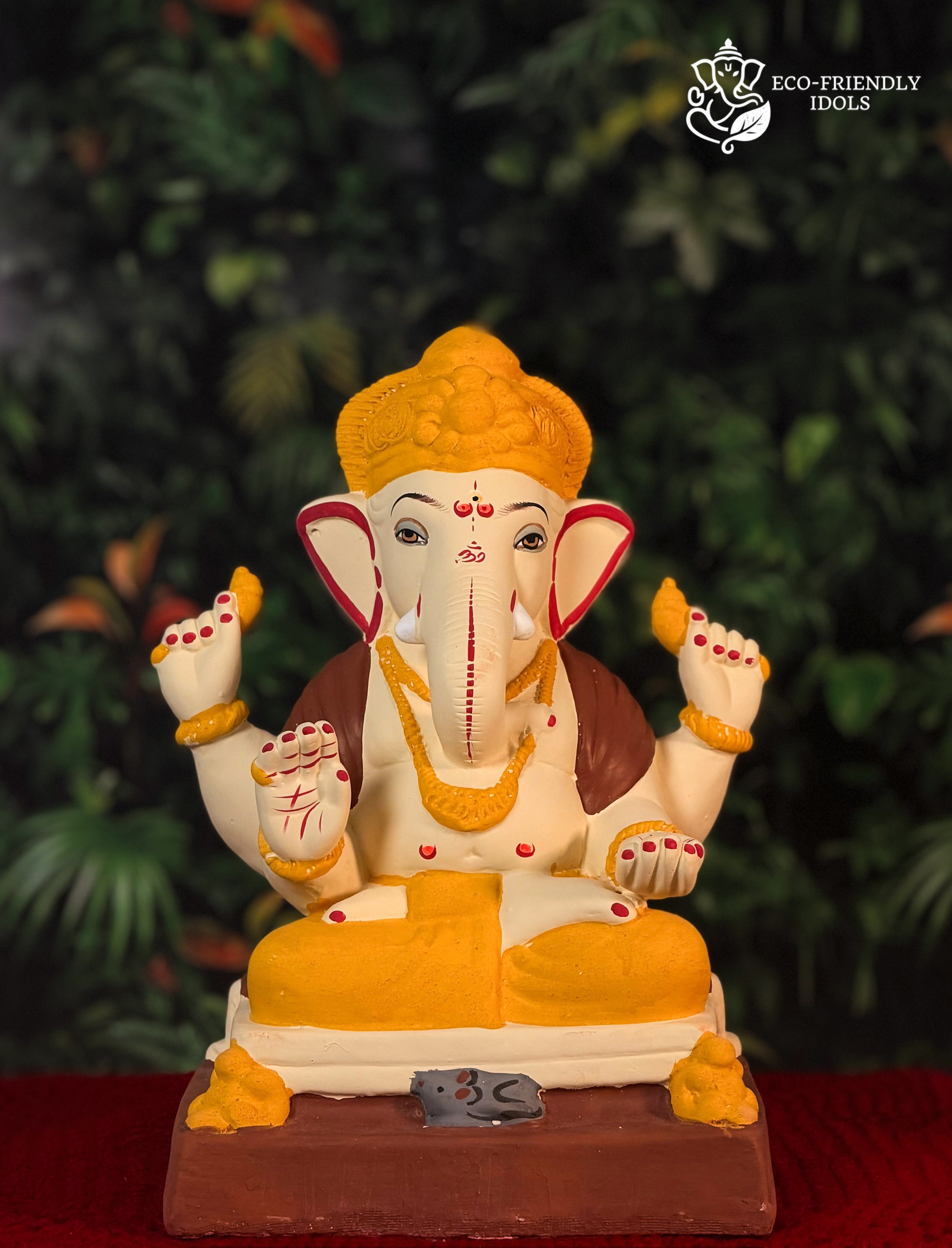 12 inch Padmasan Haldi Ganpati idol in natural turmeric yellow