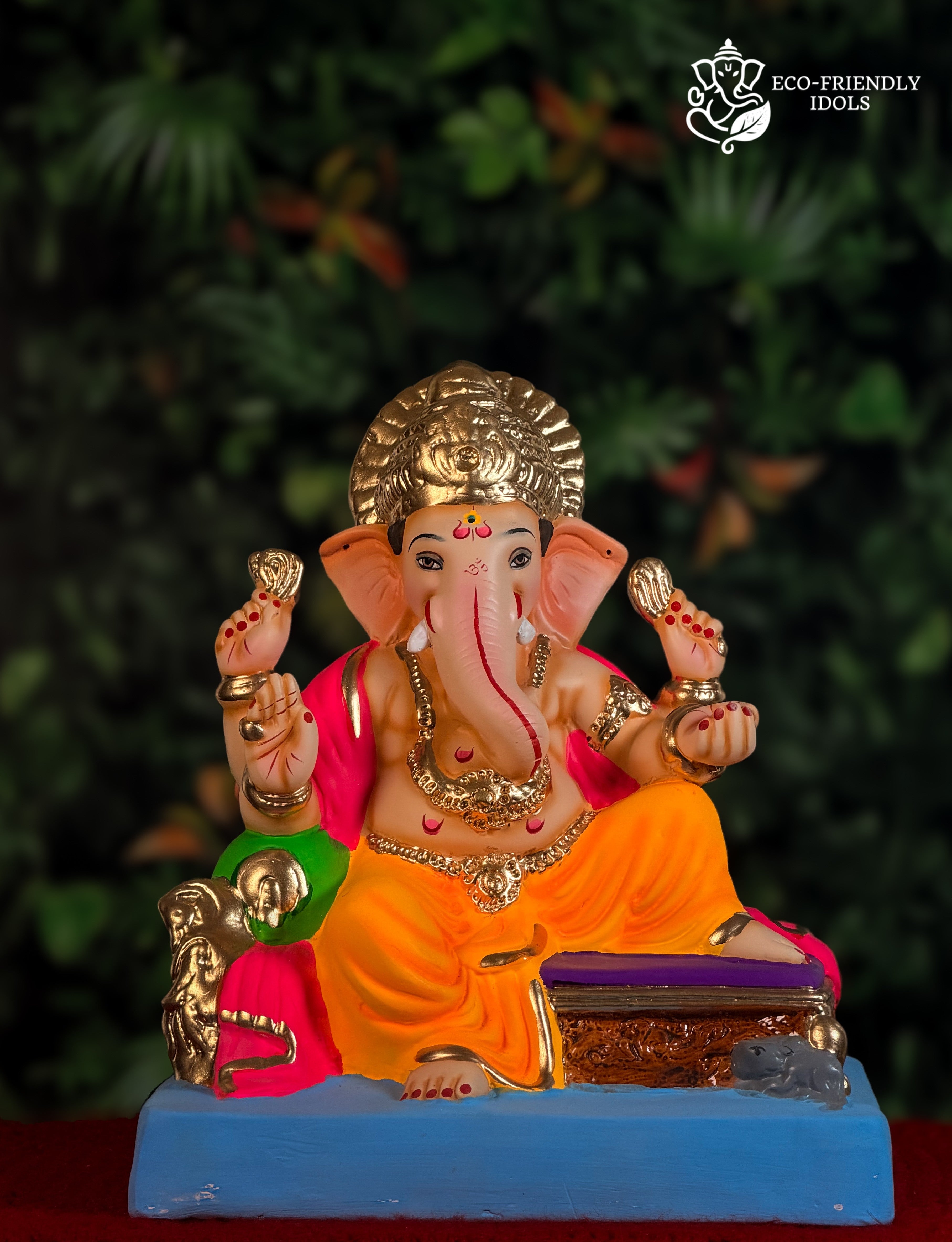 Asan style Ganesh idol in orange and pink, 12 inches, seated traditional murti