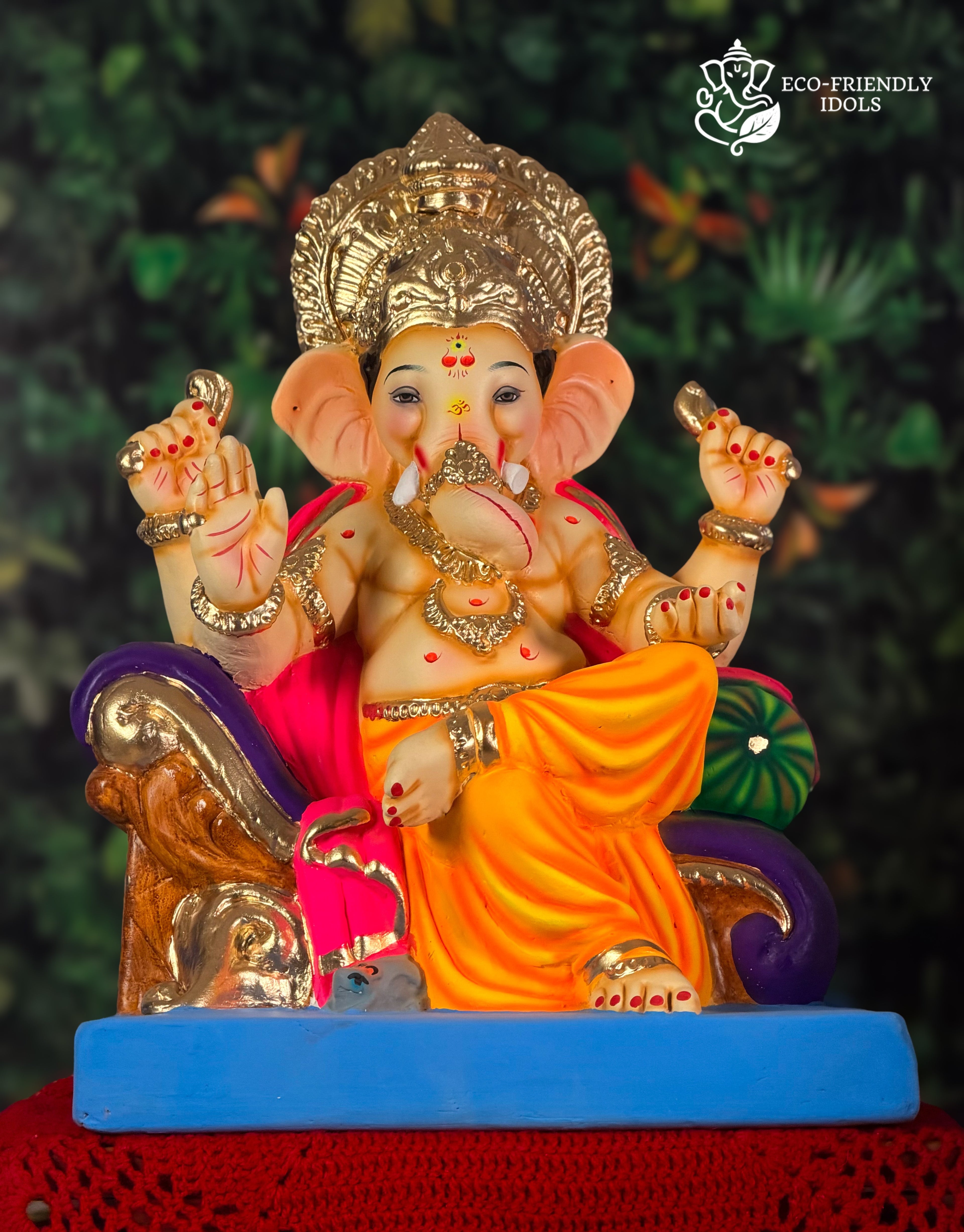 Coach Asan Ganesh idol in orange and pink, 18 inches, eco-friendly Shadu Mathi clay murti with golden crown