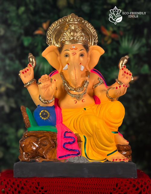 Coach Asan Ganesh idol in yellow and pink, 18 inches, eco-friendly Shadu Mathi clay murti with golden crown