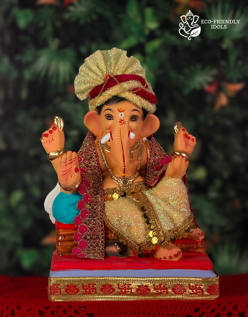 Cross Leg Single Load Ganesh idol in maroon and gold, 12 inches, eco-friendly Shadu Mathi clay murti
