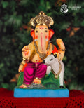 Cross Leg Vasru Ganesh idol in purple and orange with cow companion, 14 inches, eco-friendly Shadu Mathi clay murti
