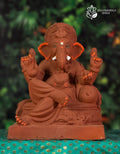 Cross Mandi Ganesh idol in natural red soil with colored borders, 12 inches, eco-friendly handmade murti