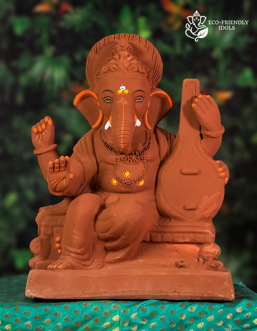 Cross Mandi Veena Ganesh idol in natural red soil with colored borders, 15 inches, eco-friendly handmade murti
