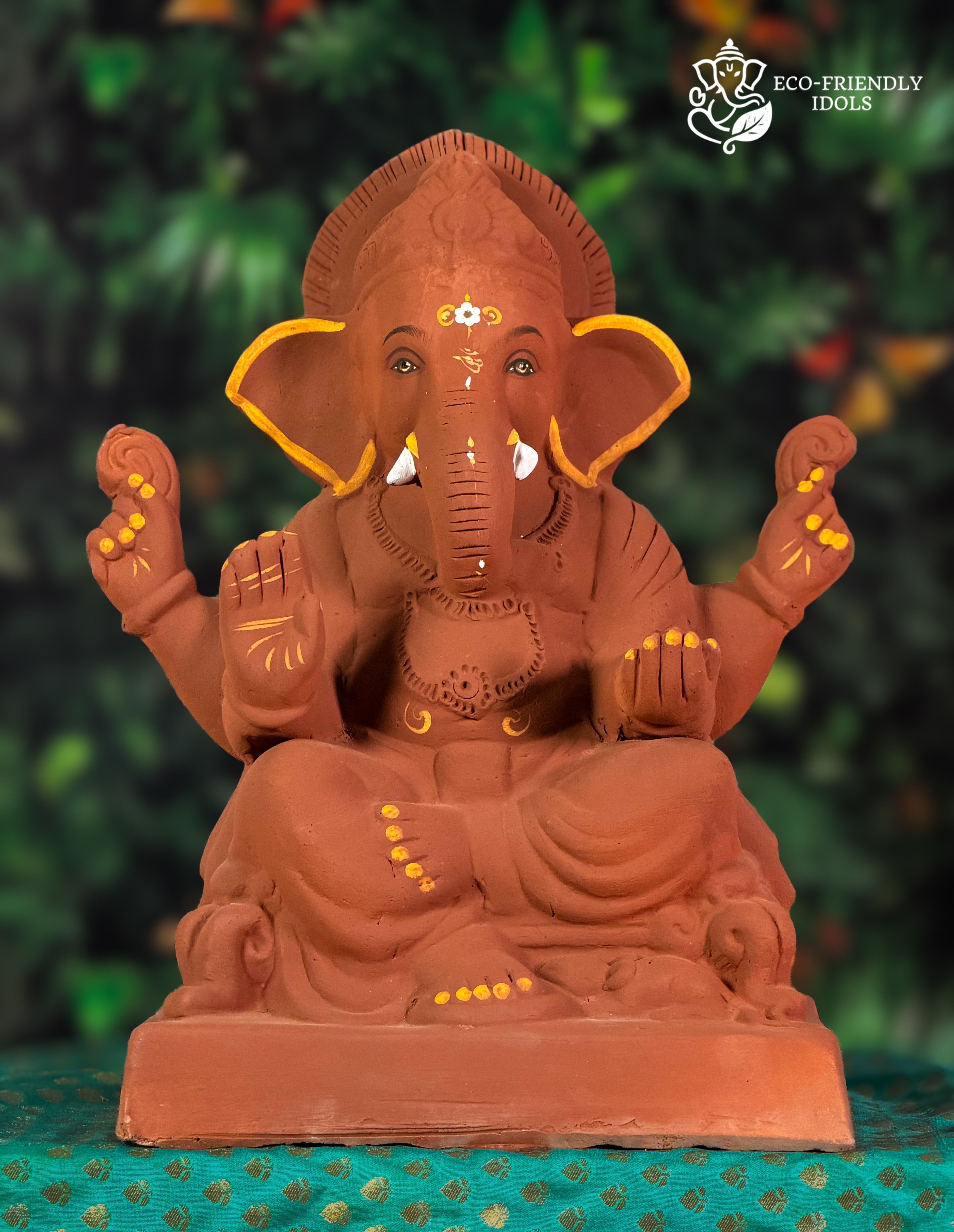 Nakshi Ganesh idol in natural red soil with colored borders, 12 inches, eco-friendly handmade murti with relief carving