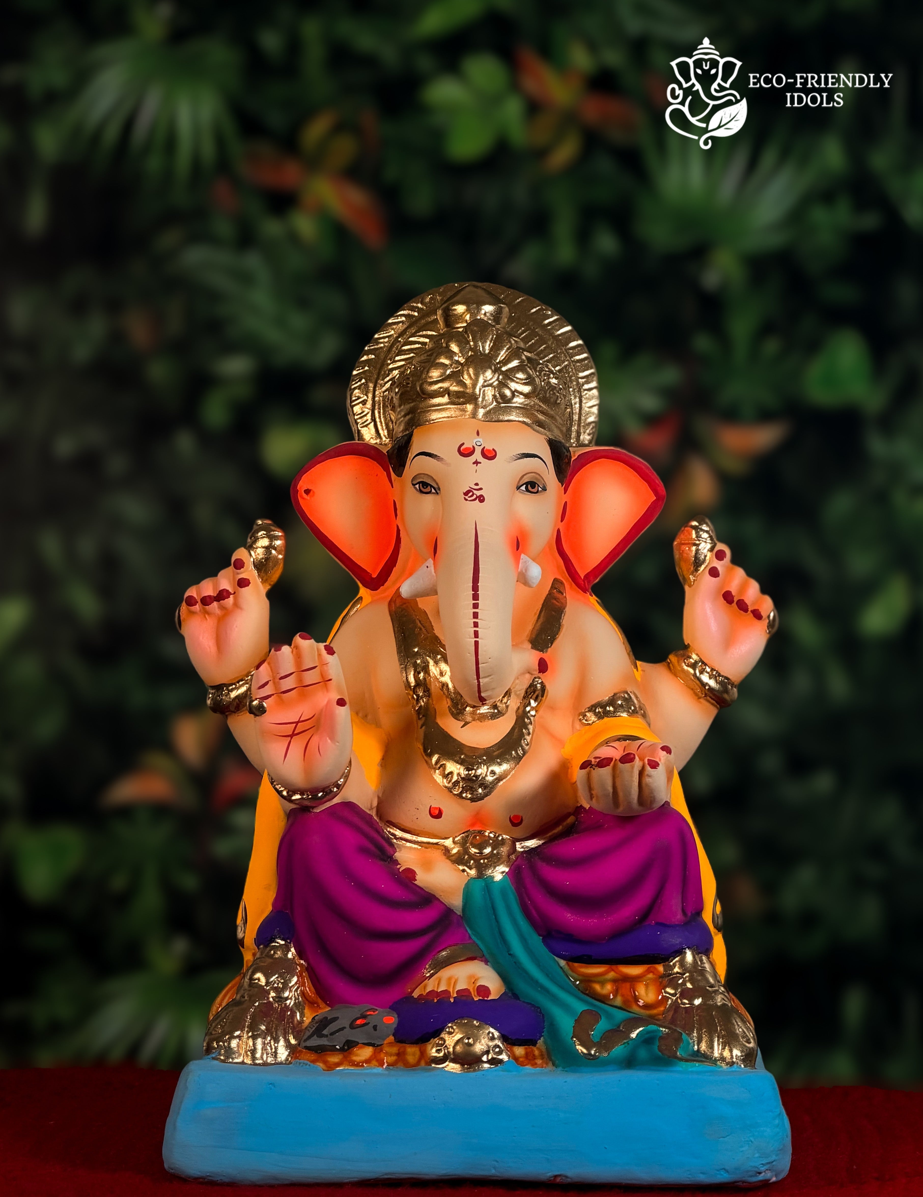 Shop the 14-inch Philips Ganesh idol in Purple & Yellow. Unique styling and vivid colors, perfect for a standout festive decor.